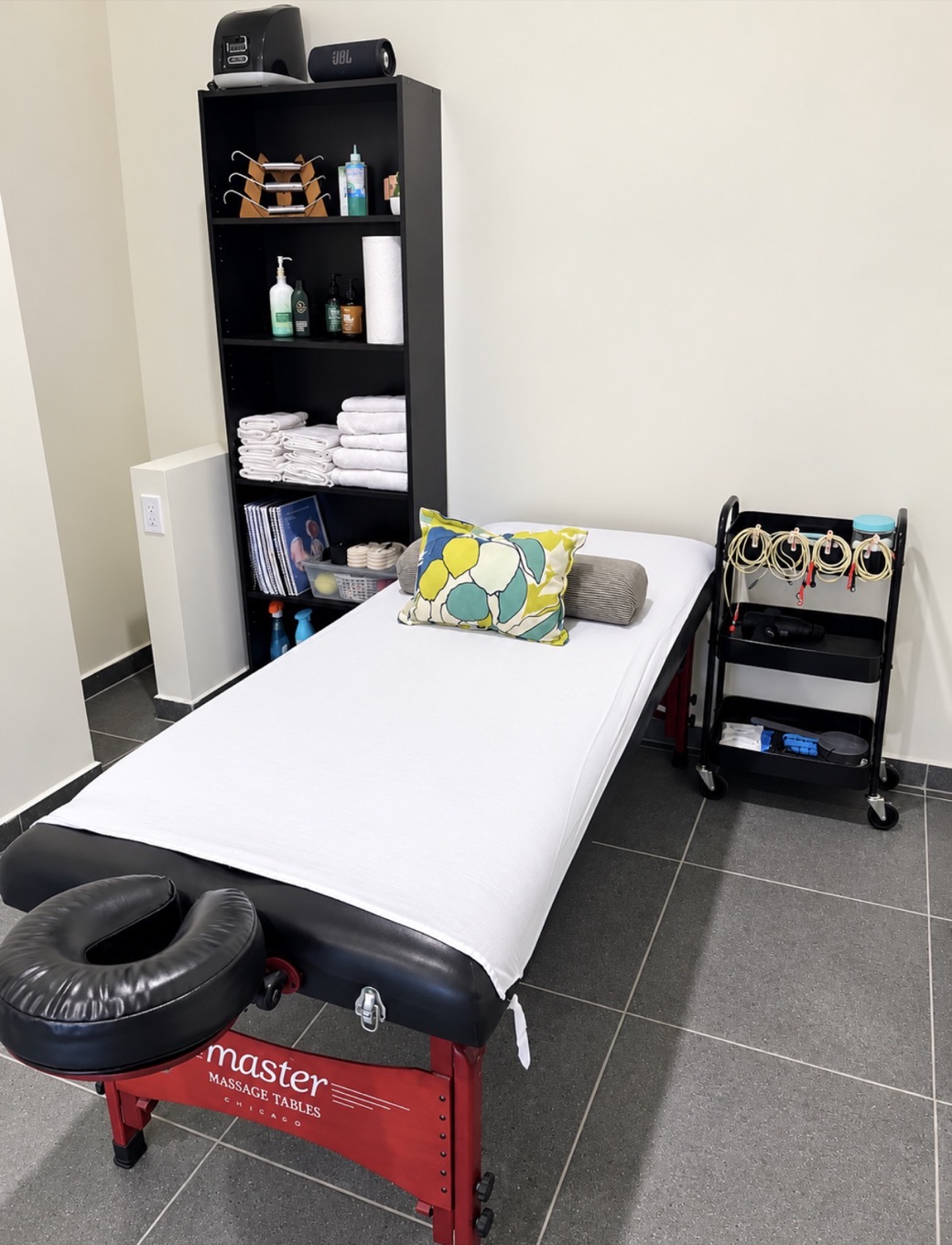Private treatment room with massage table